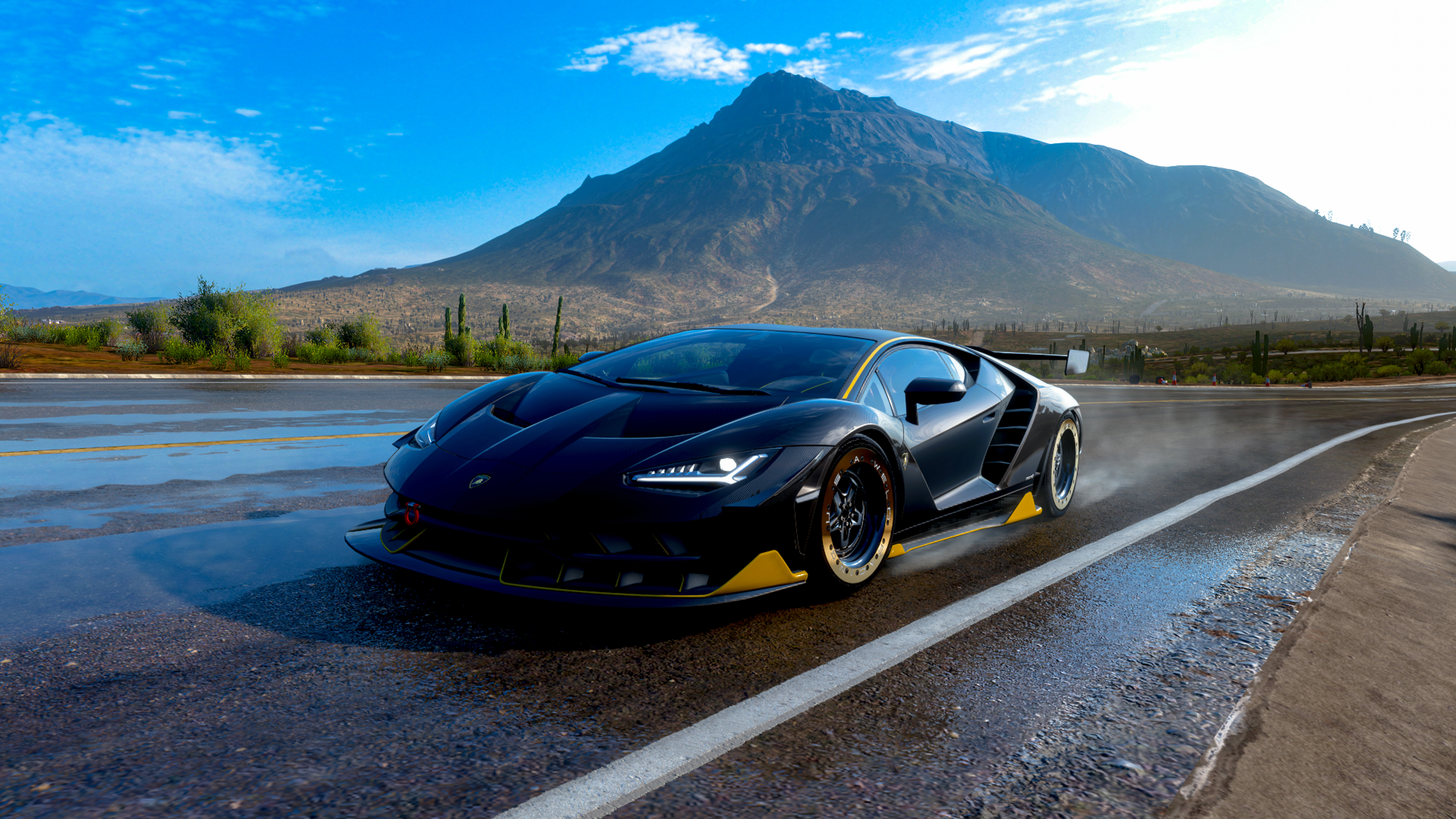 Forza Horizon 5 oyununda oynanırken çekilmiş, yüksek performanslı bir Lamborghini Centenario süper spor otomobil.
